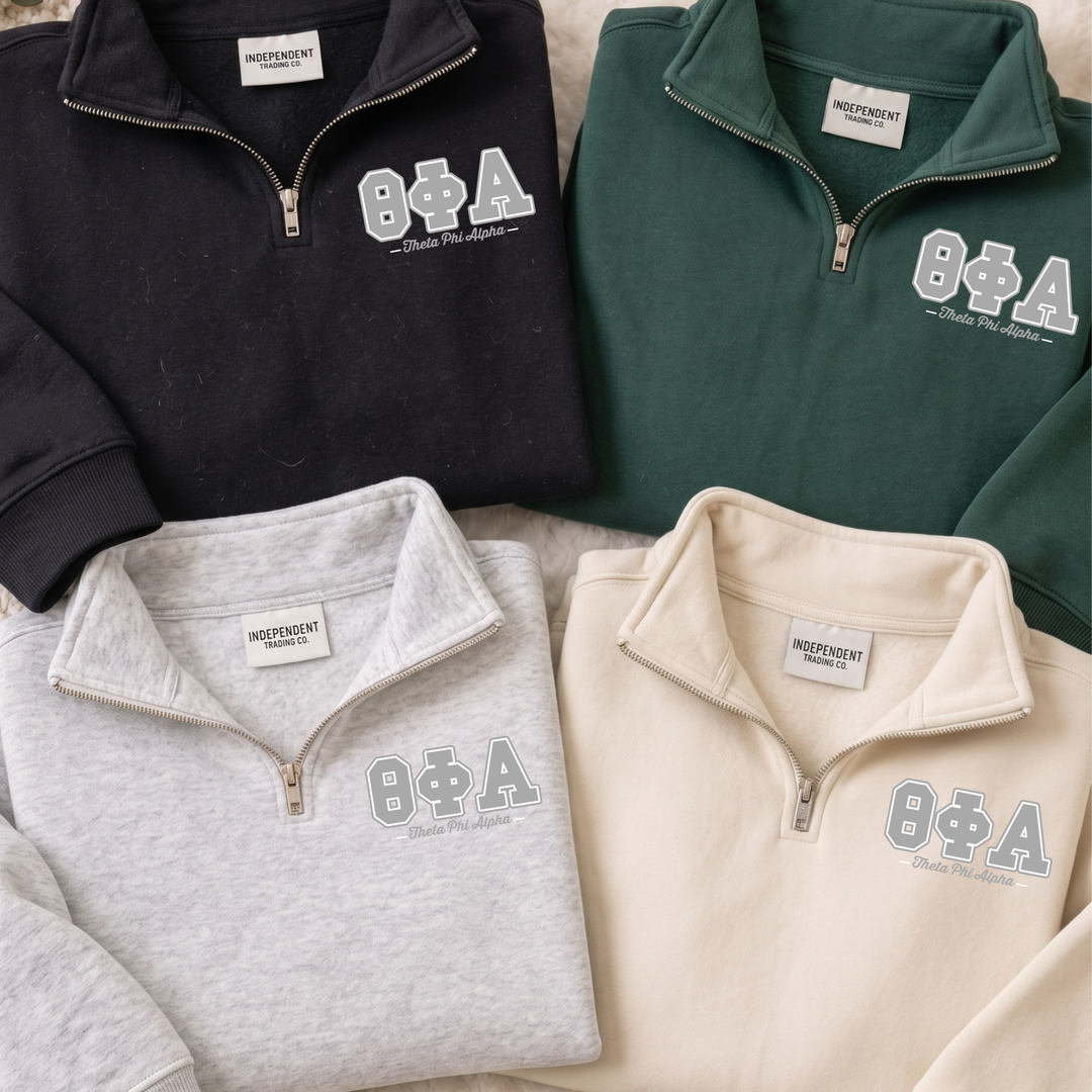 a collection of four different colored sweatshirts, each with the same logo and text on the front.