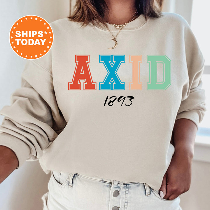 a woman wearing a sweatshirt with the word axid printed on it