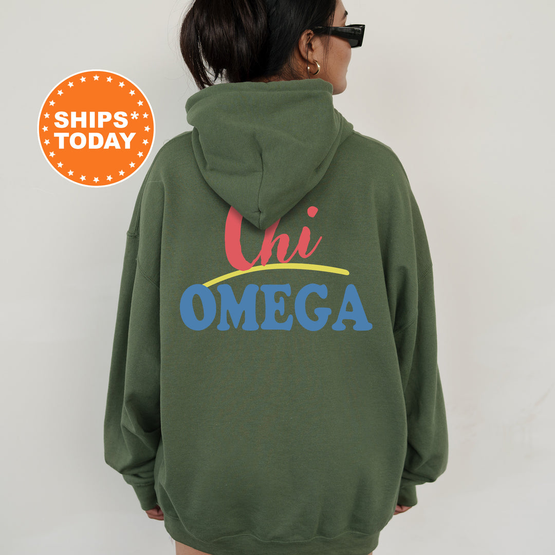 A person wearing a green hoodie with the text "Chi Omega" printed on it.