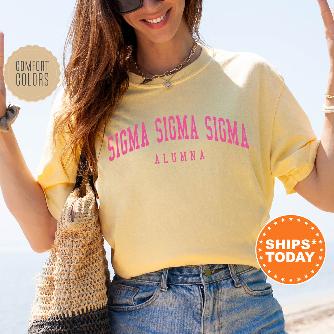 a woman in a yellow shirt holding up a peace sign