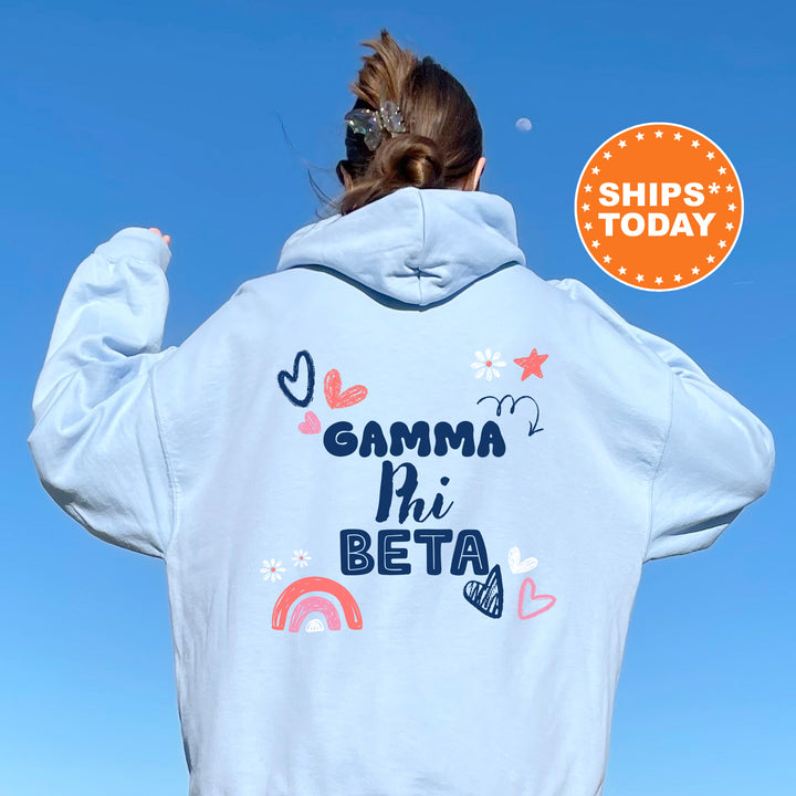 a woman wearing a white hoodie with the words gamma hi beta on