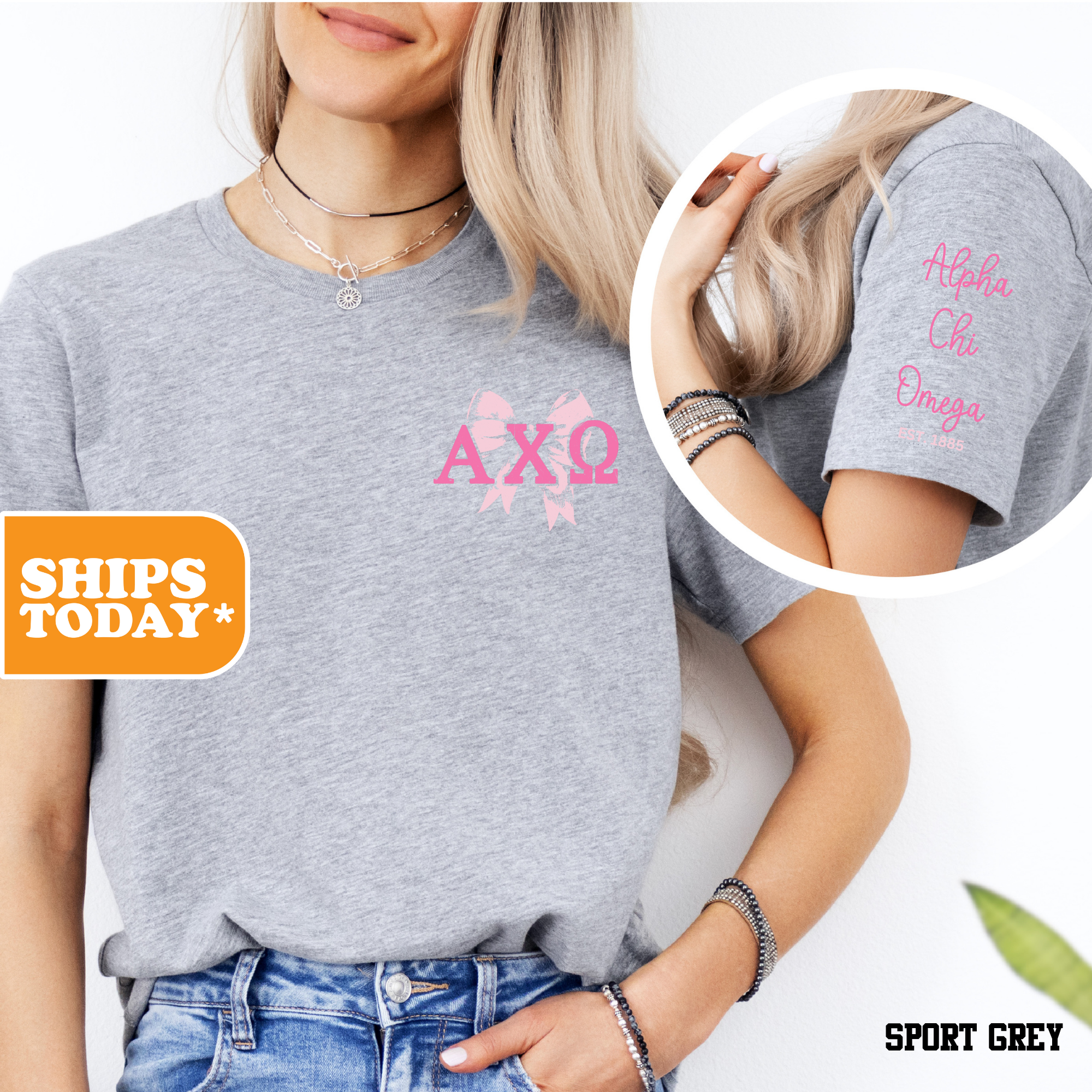 a woman wearing a grey shirt with pink letters on it