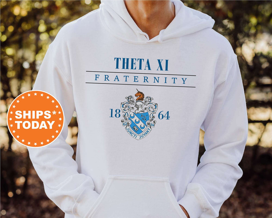 a person wearing a white hoodie with a blue crest on it
