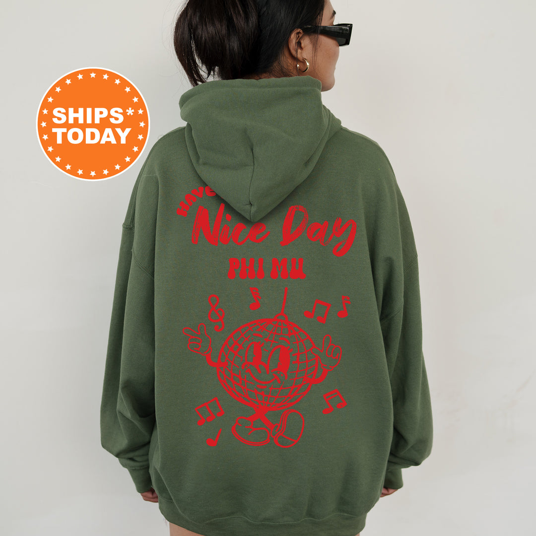 a woman wearing a green hoodie with red writing on it