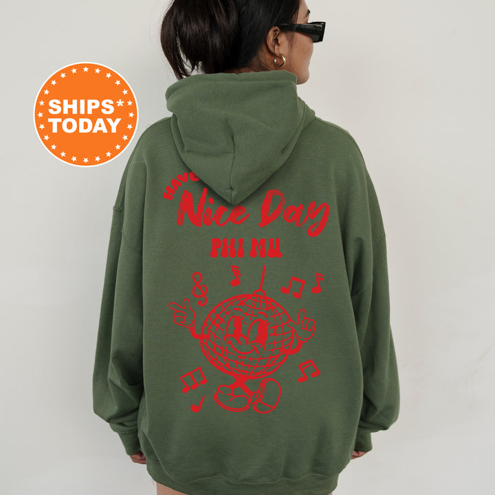 a woman wearing a green hoodie with red writing on it