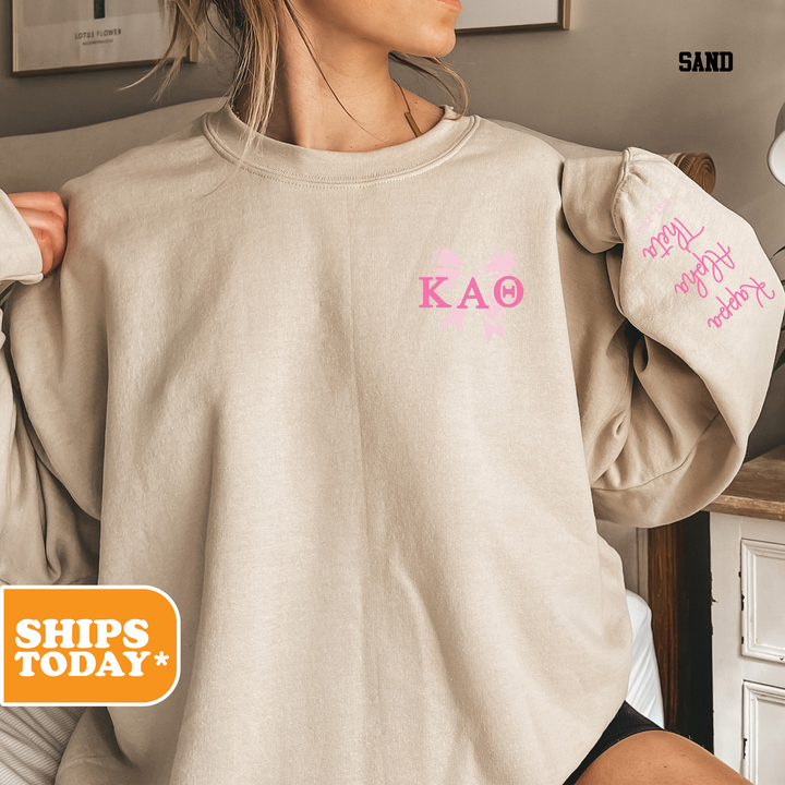 a woman wearing a sweatshirt with pink letters on it