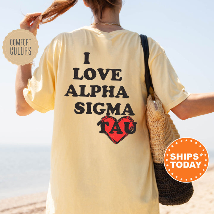 a woman with a yellow shirt that says i love alpha sigma