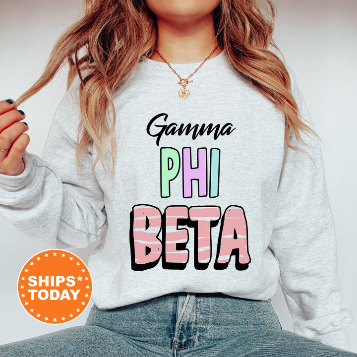 a woman wearing a sweatshirt that says, gumma phi beta ships today