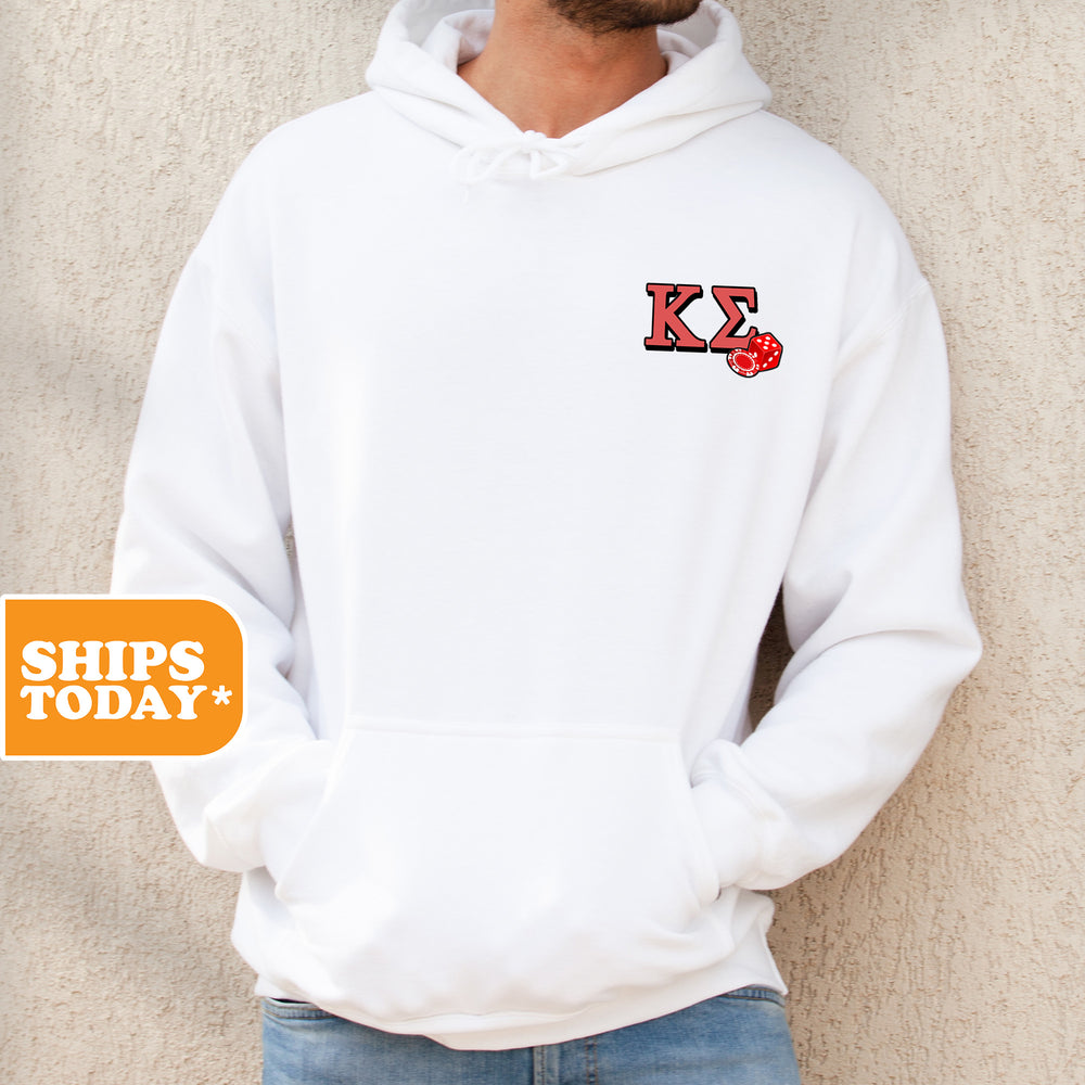a man wearing a white hoodie with a k on it