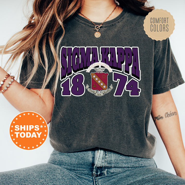 a woman wearing a tshirt with a football on it