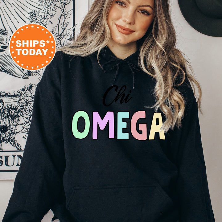 a woman wearing a black hoodie that says oh omega