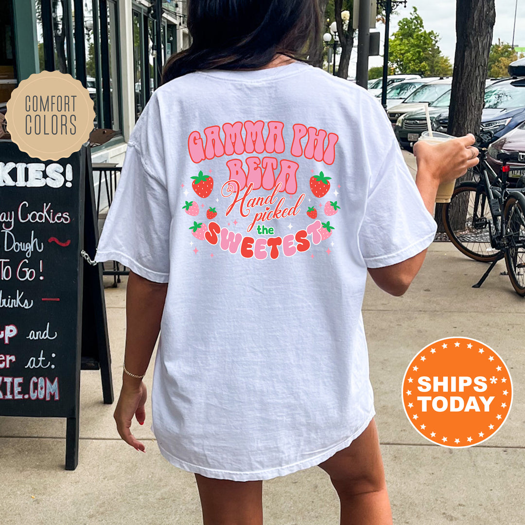 a woman in a white shirt is walking down the street