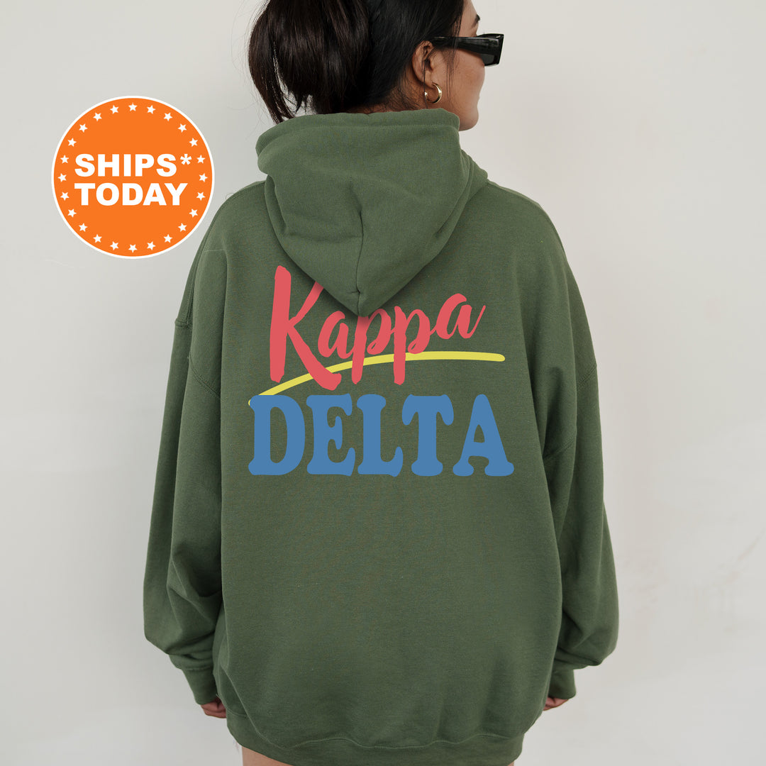 A person wearing a green hoodie with the text " Kappa Delta" printed on it.