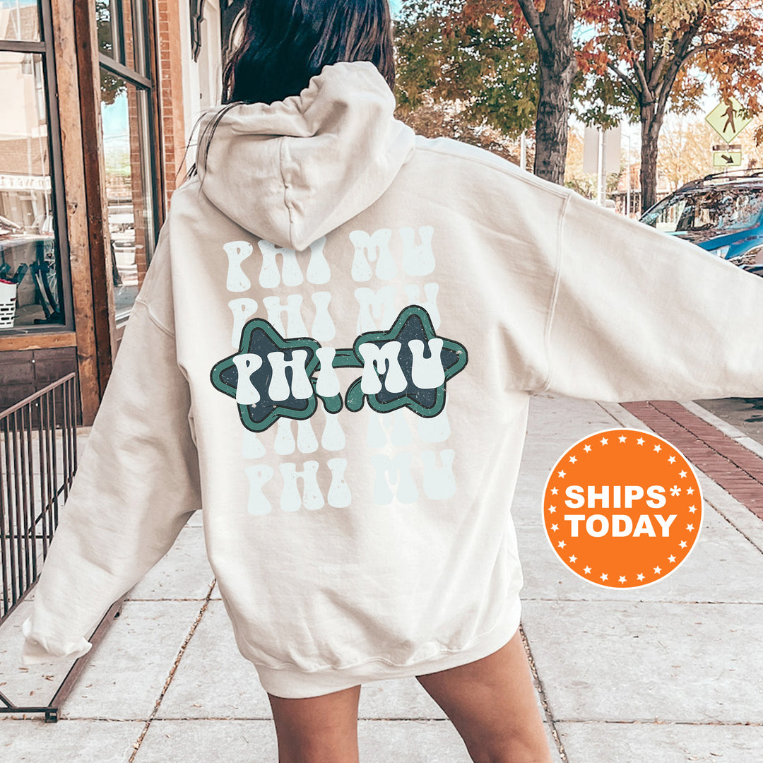 a woman in a white hoodie is walking down the street