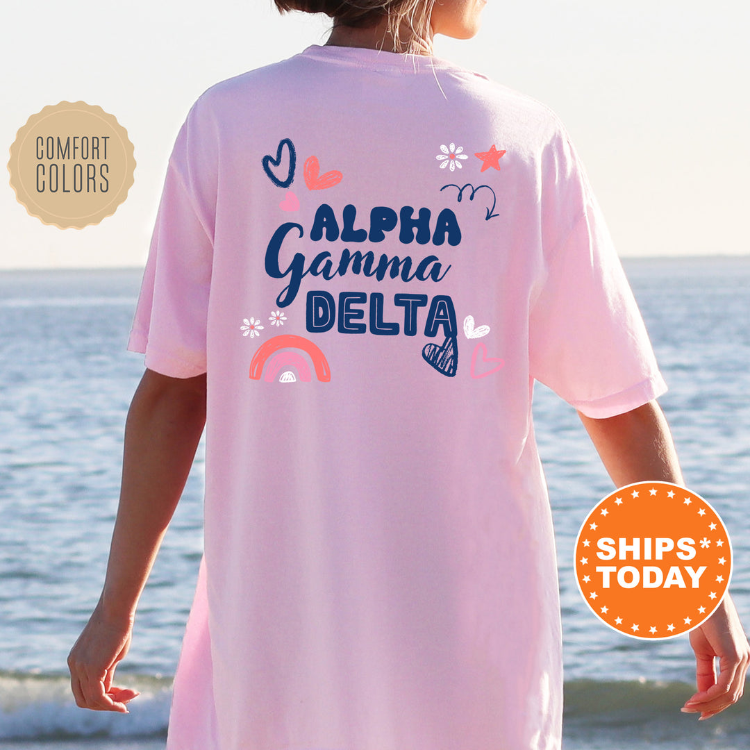 a woman wearing a pink shirt that says, aloh gamma delta