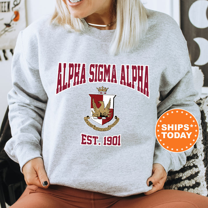 a woman sitting on a chair wearing a sweatshirt