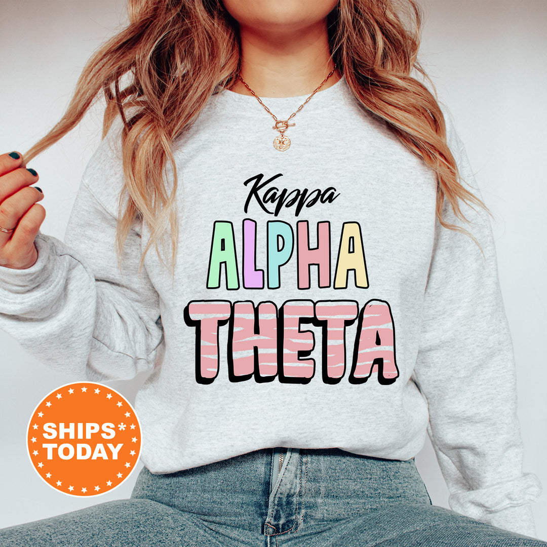 a woman wearing a sweatshirt that says kapaa, alpha, the