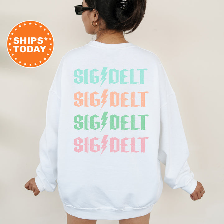 a woman wearing a white sweatshirt with the words sig / debt on it