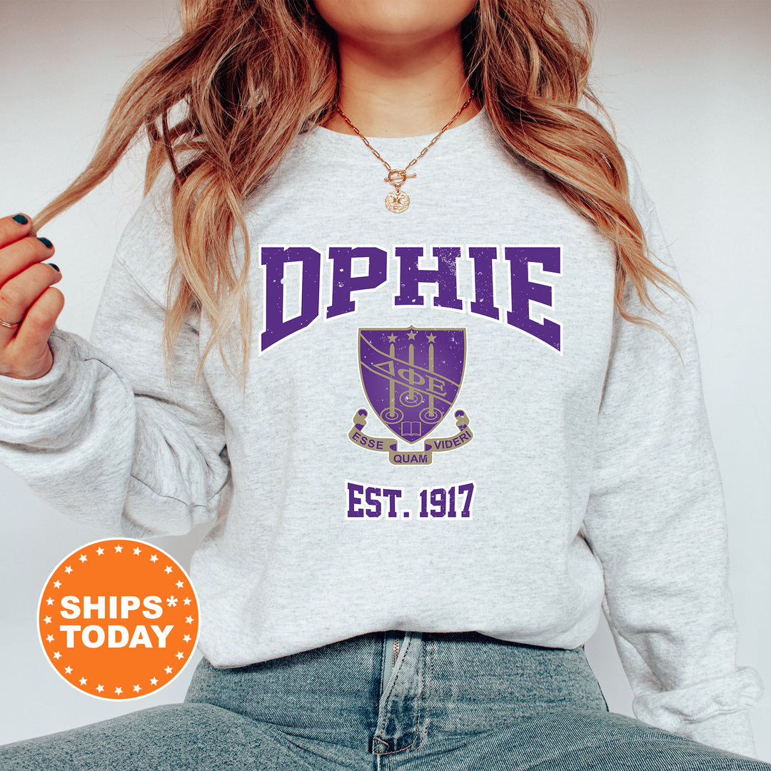 a woman wearing a sweatshirt that says dppie est 1917