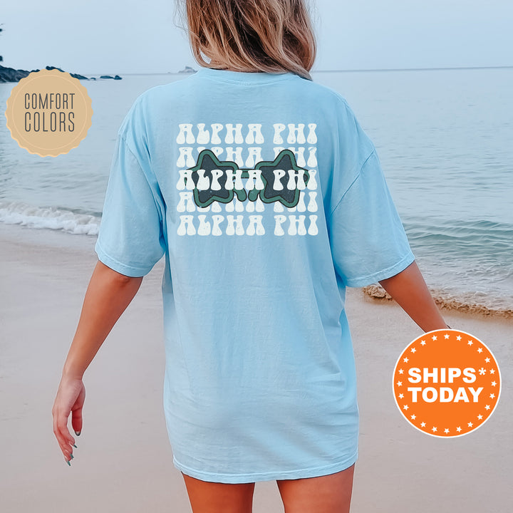 a woman walking on the beach with a surfboard