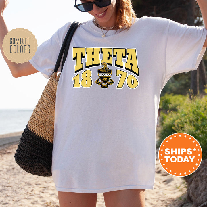 a woman wearing a t - shirt that says thea in yellow and black