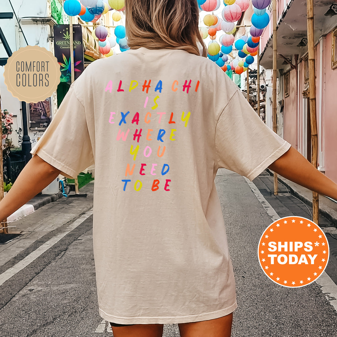 a woman is walking down the street wearing a t - shirt that says aloh