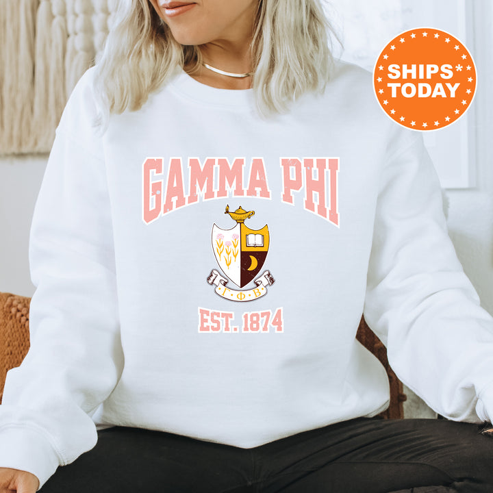 a woman sitting on a chair wearing a white sweatshirt
