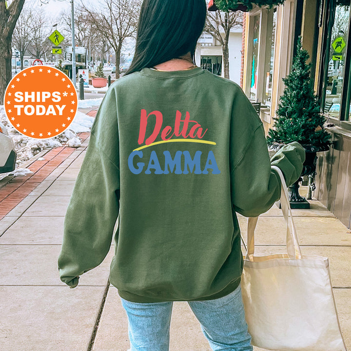 A person wearing a green sweatshirt with the Delta Gamma sorority logo is walking down a city street, carrying a white bag.