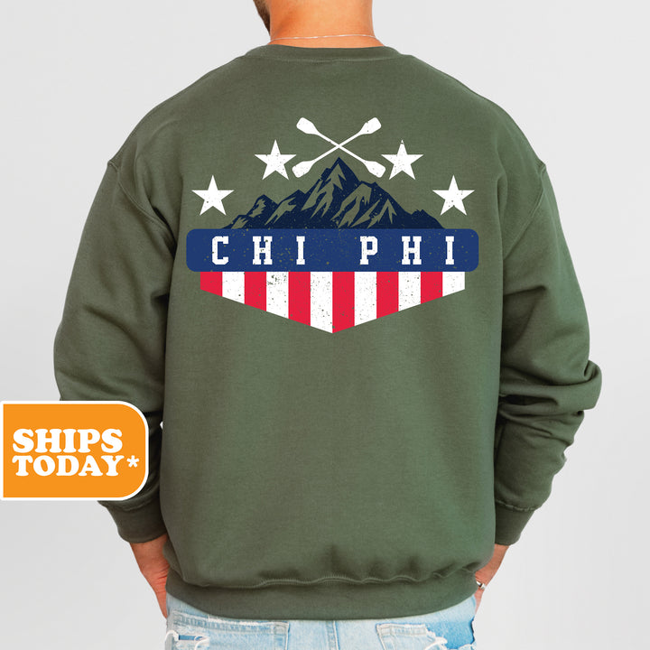 a man wearing a green sweatshirt with the american flag on it