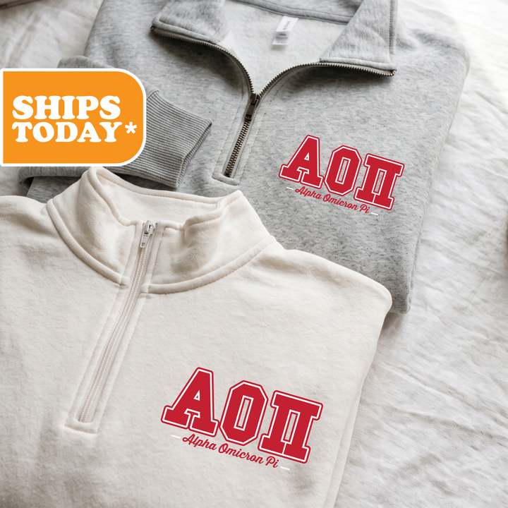 Two gray and white sweatshirts with red text and logos, one of which says "AOPI Alpha Omega Pi".