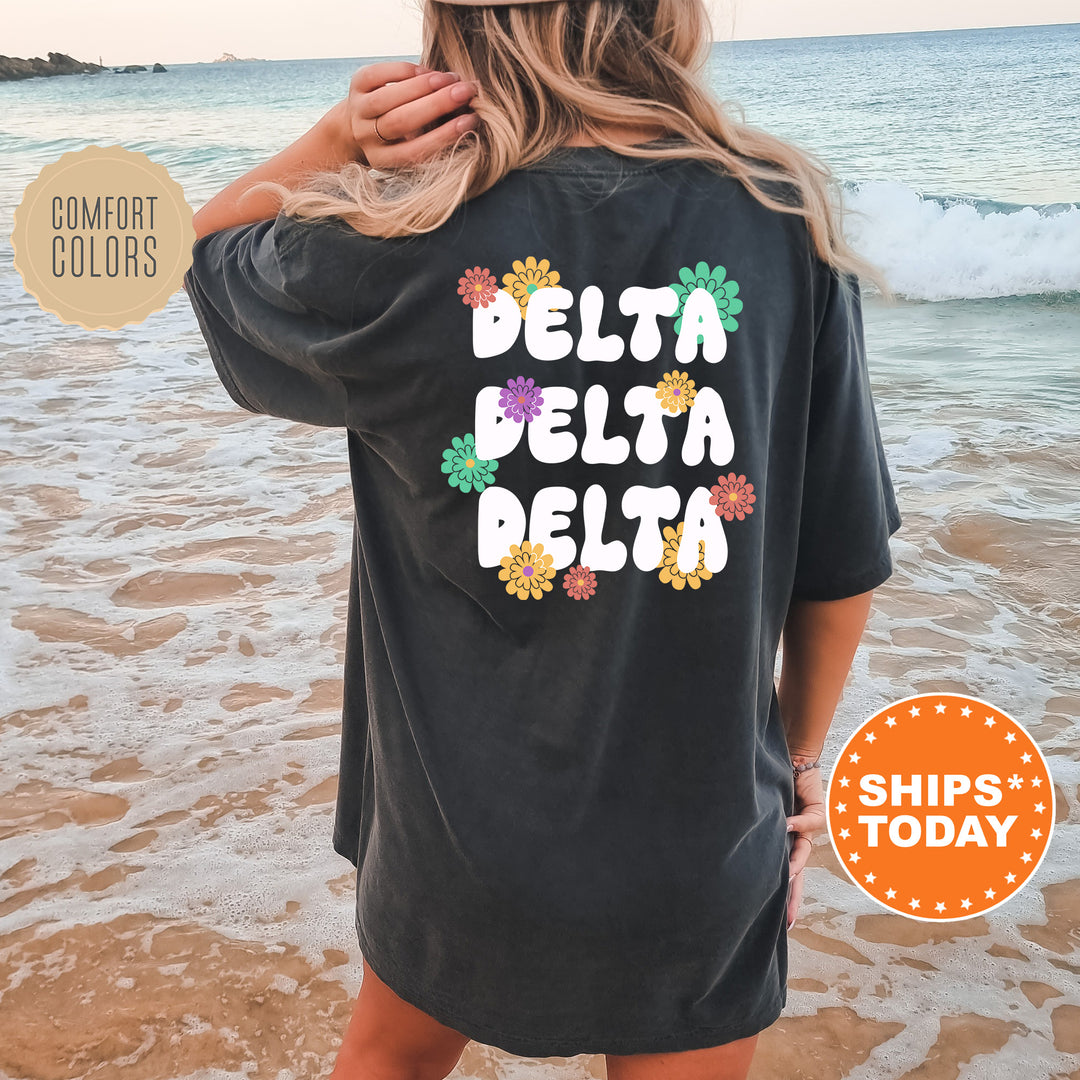 a woman wearing a black shirt that says delta delta