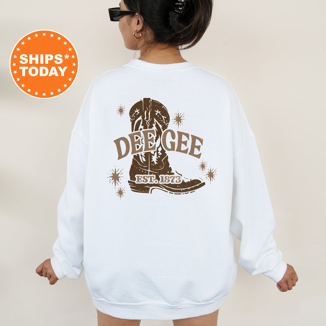 a woman wearing a white sweatshirt with a design on it