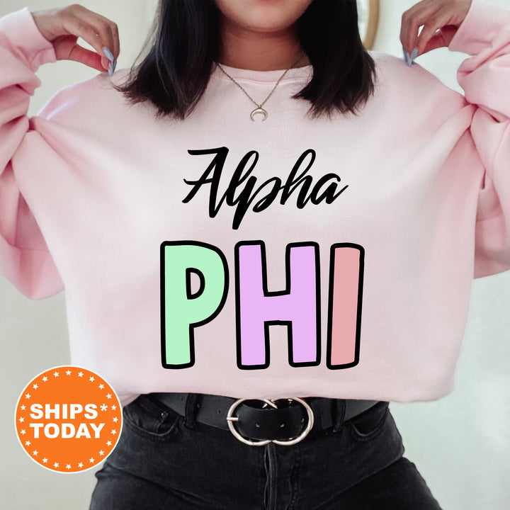 a woman wearing a pink sweatshirt with the words, ahha pho on it