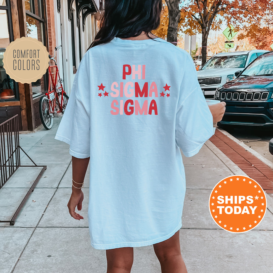 a woman is walking down the sidewalk wearing a t - shirt