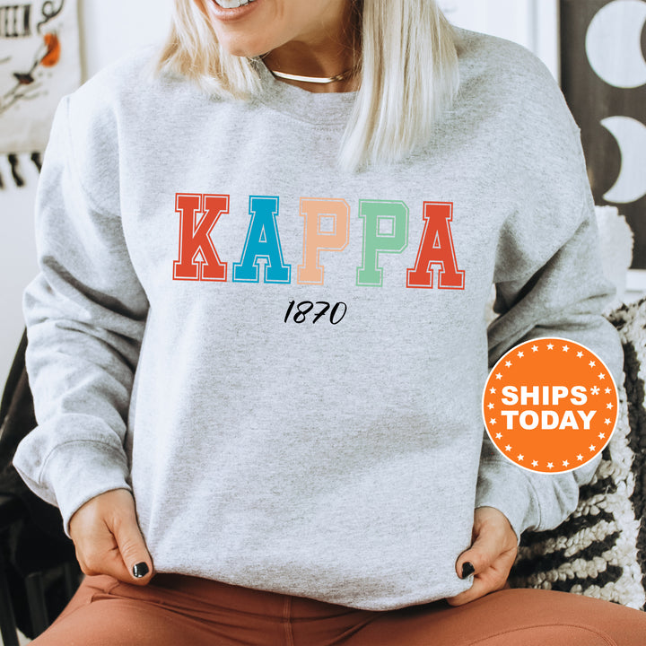 a woman wearing a sweatshirt that says kappa