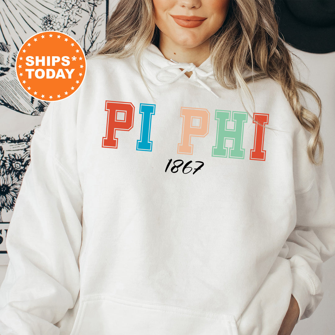 a woman wearing a white hoodie with the word phi on it