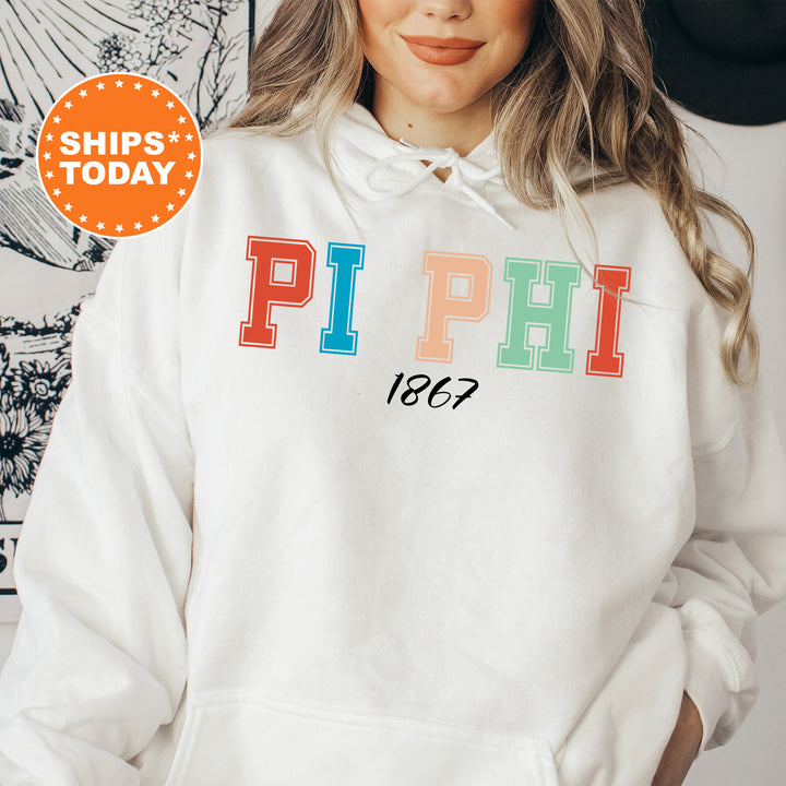 a woman wearing a white hoodie with the word phi on it