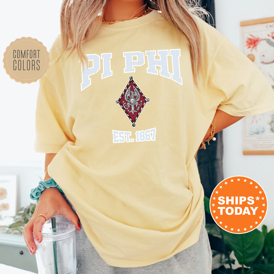 a woman wearing a yellow phi phi shirt