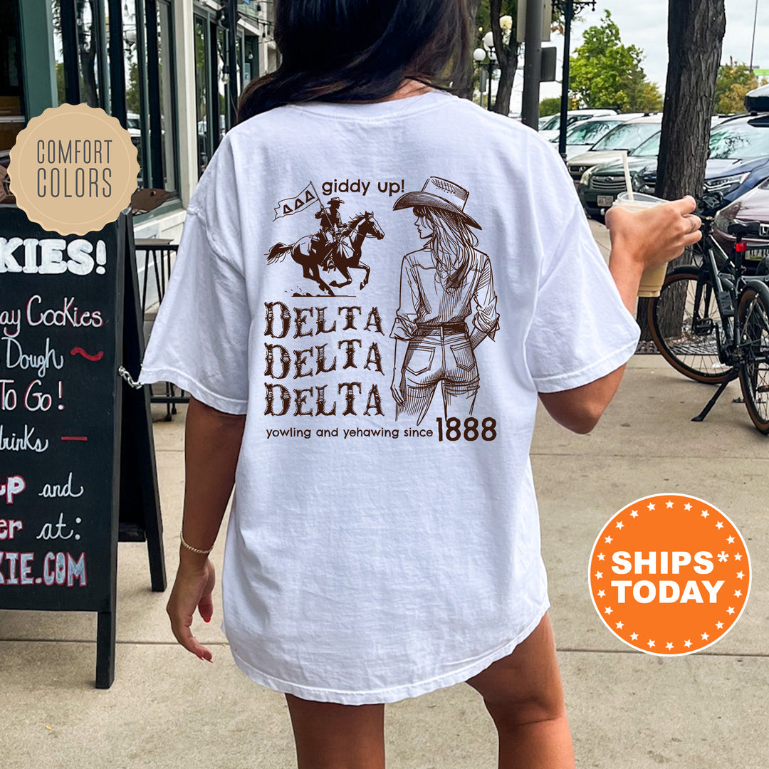 a woman wearing a white delta delta t - shirt