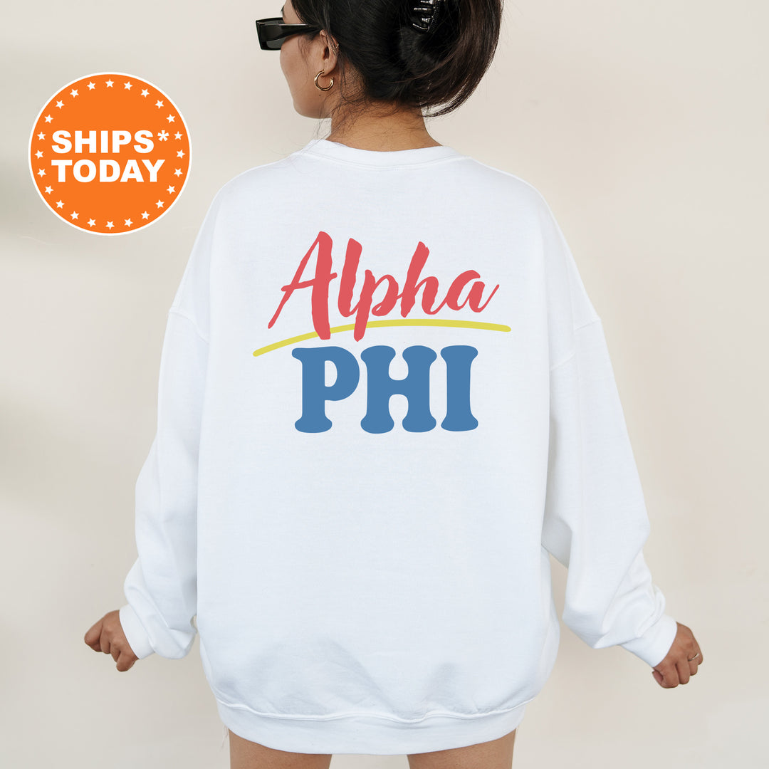 A person wearing a white sweatshirt with the text "Alpha Phi" printed on it.