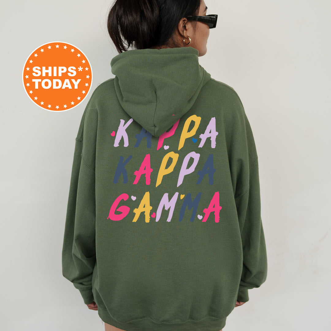 a woman wearing a green hoodie with the words happy game printed on it