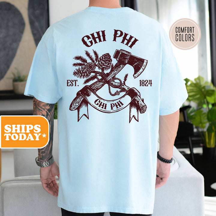a man in a blue shirt with a hammer and pine tree on it