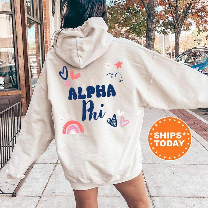 a woman walking down a sidewalk wearing a white hoodie