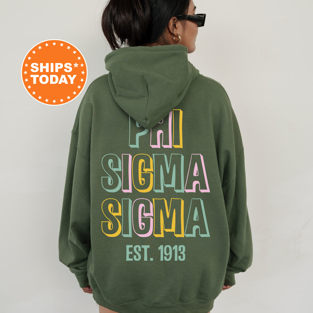 a woman wearing a green hoodie with the words stigma stigma on it