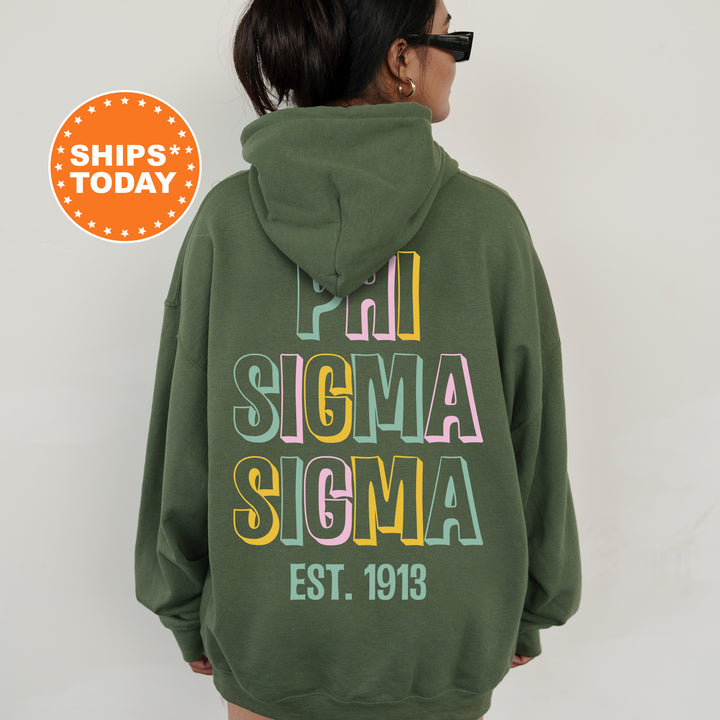 a woman wearing a green hoodie with the words stigma stigma on it
