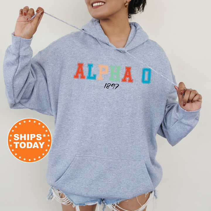 a woman wearing a blue hoodie with the word alpeno printed on it