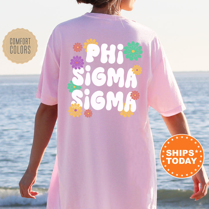 a woman wearing a pink shirt that says phi sigmm