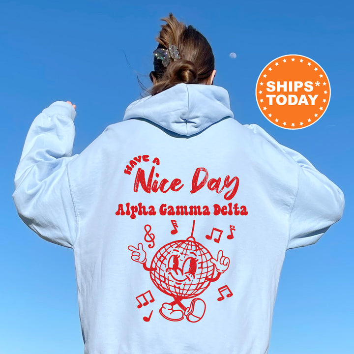 a woman wearing a white hoodie with the words nice day on it