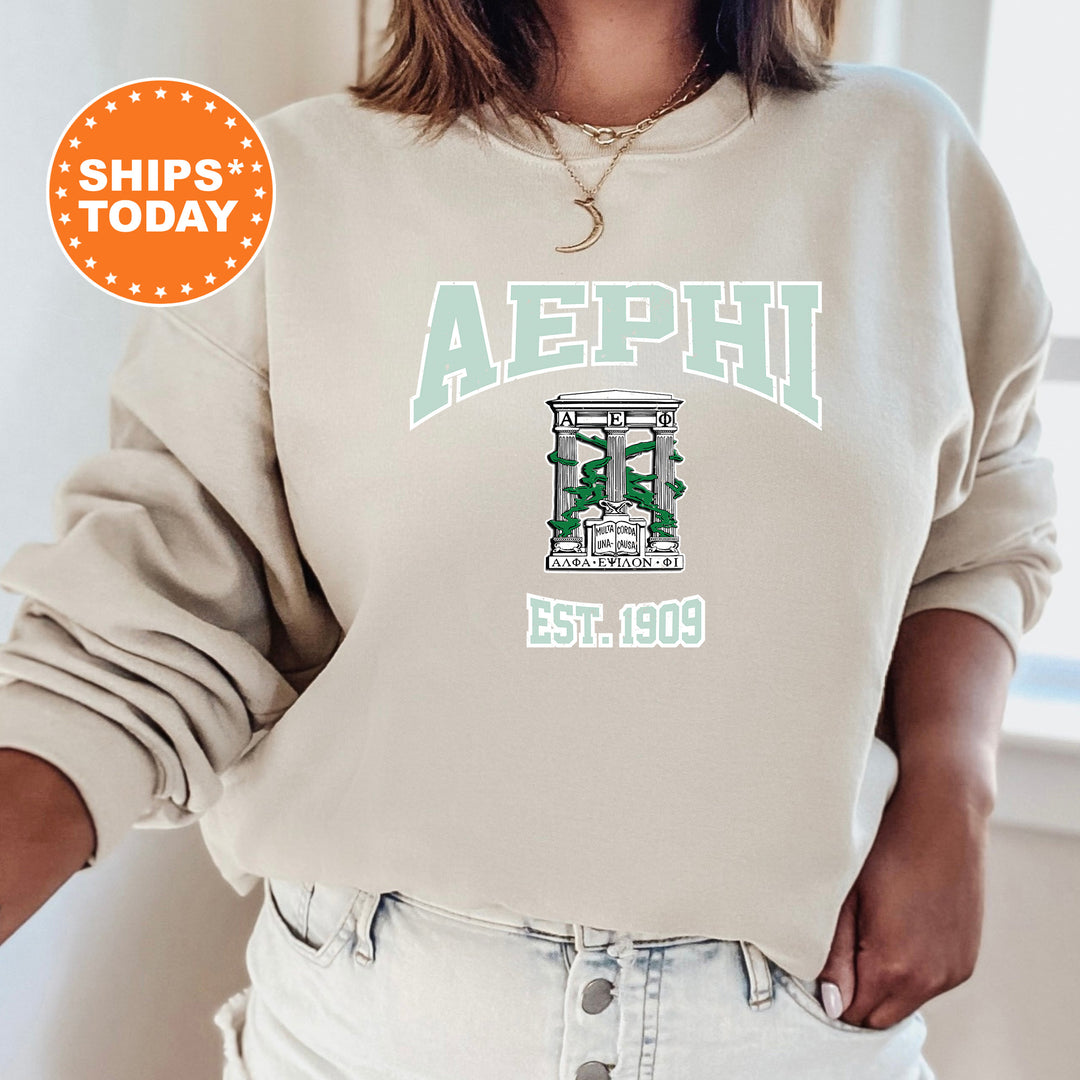 a woman wearing a sweatshirt with the word aephh printed on it