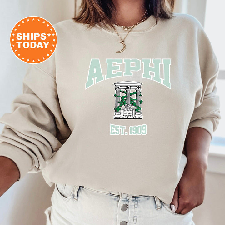 a woman wearing a sweatshirt with the word aephh printed on it